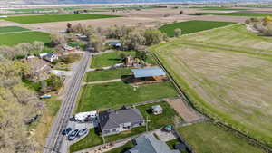Birds eye view of property featuring a rural view