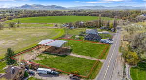 Aerial view featuring a mountain view and a rural view