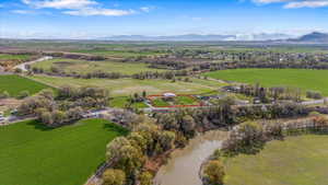 Bird's eye view with a rural view and a water and mountain view