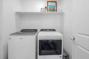 Laundry area with separate washer and dryer and laundry area