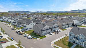 Drone / aerial view with a mountain view and a residential view