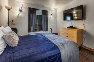 Bedroom featuring wood finished floors