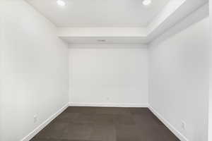 Unfurnished room featuring visible vents, baseboards, and recessed lighting