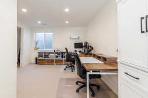 Office space featuring recessed lighting, carpet, and visible vents