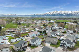 Aerial view featuring a Wellsville Mountains view and a residential view