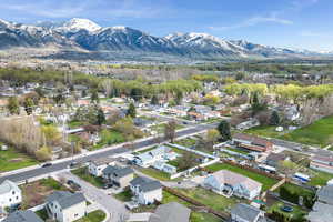 Aerial view of property with a Bear River Mountains view and a residential view