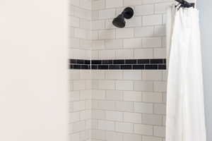 Interior details featuring tiled shower