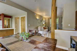 Dining space with visible vents and baseboards