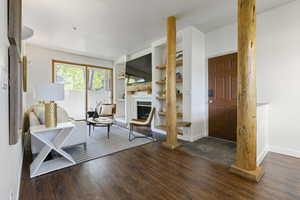 Living Room with sliding glass door to the enclosed patio.