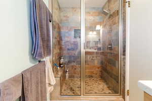 Bathroom featuring a shower stall