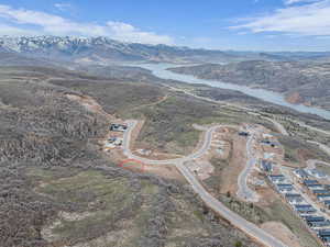 Aerial view featuring a water and mountain view
