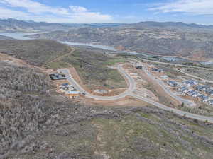 Bird's eye view featuring a water and mountain view