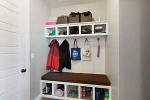 Mudroom featuring baseboards