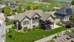 Aerial view of residential area featuring a mountainous background