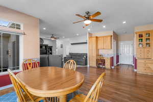 Dining space featuring recessed lighting, wood finished floors, a ceiling fan, and baseboards