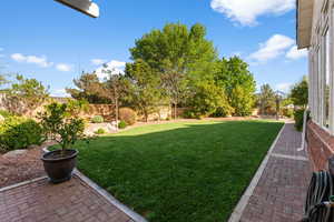 View of yard with a fenced backyard