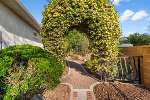 View of yard featuring fence
