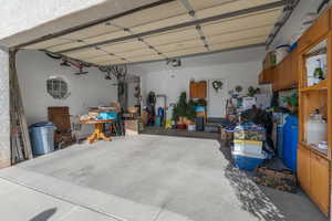 Garage featuring a garage door opener