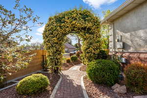 View of yard featuring fence