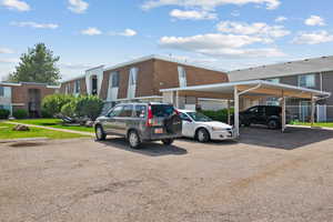 View of partially covered parking lot
