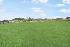 View of yard with a mountain view