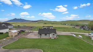 Property view of mountains featuring a rural view