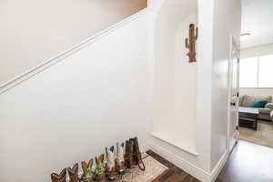 Interior space featuring wood finished floors and baseboards