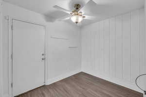 Area just inside the side entrance that can be used as an office/den or mudroom.