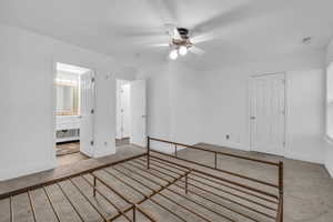 Primary bedroom with private bathroom and closet