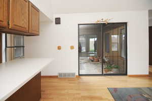 Kitchen looking into the Atrium