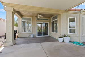 View of patio with a ceiling fan