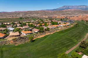 Birds eye view of property with a residential view, a mountain view, and golf course view