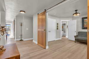 Entryway with corridor with access to bedroom & office