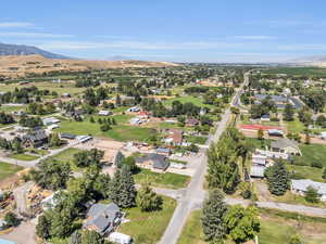 Aerial view of property & surrounding neighborhood