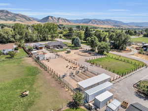 Aerial view of property featuring mountain views