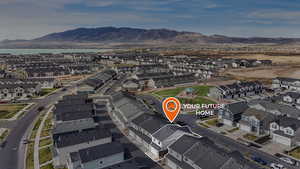 Drone / aerial view with a residential view and a mountain view