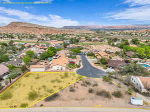 Drone / aerial view featuring a residential view and a mountain view