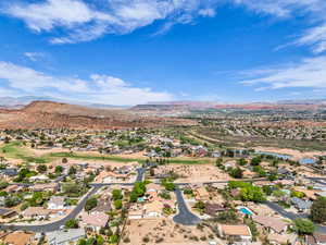 Bird's eye view with a water and mountain view and a residential view