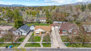 Drone / aerial view featuring a residential view and a mountain view