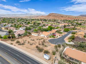 Birds eye view of property featuring a mountain view and a residential view