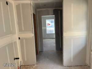 Primary bathroom looking into the walk in closet