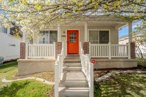 View of front of home with covered porch