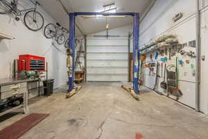 Garage featuring a workshop area
