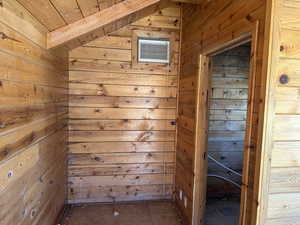 View of stable with a wall mounted AC