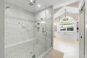 Full bathroom featuring visible vents, a shower stall, recessed lighting, and a chandelier