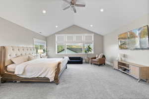 Bedroom featuring recessed lighting, vaulted ceiling, carpet floors, and ceiling fan