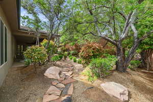 View of yard featuring fence