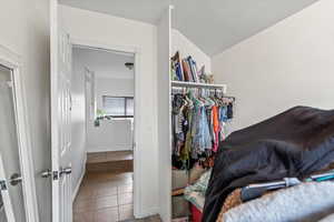 Spacious closet featuring tile patterned floors