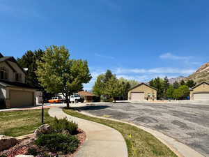 Exterior space with a detached garage
