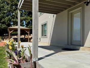 View of patio / terrace featuring a gazebo. Entrance to Mother-in-law